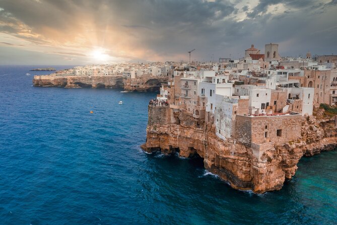 Alberobello, Castellana Caves and Polignano Guided Tour from Bari - Polignano a Mare: cliffside alleys, sea views, and the town’s famous faces