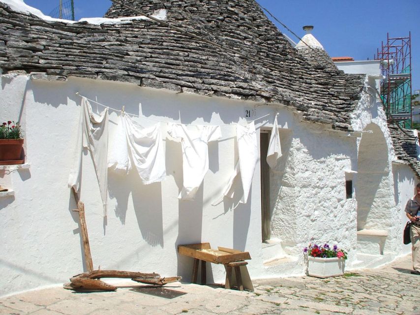 Alberobello's Trulli: 2-Hour Guided Walking Tour - Casa d’Amore and the named history on quieter streets