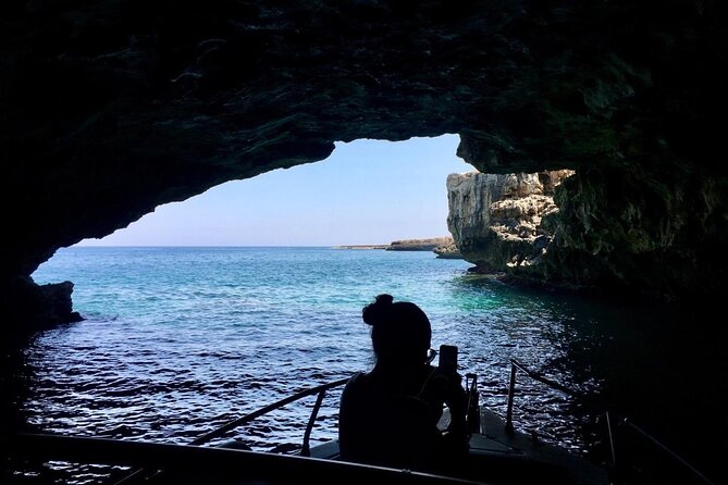 Boat excursion to Polignano a Mare between caves and coves - The Domenico Modugno statue stop: a quick landmark with real emotional context