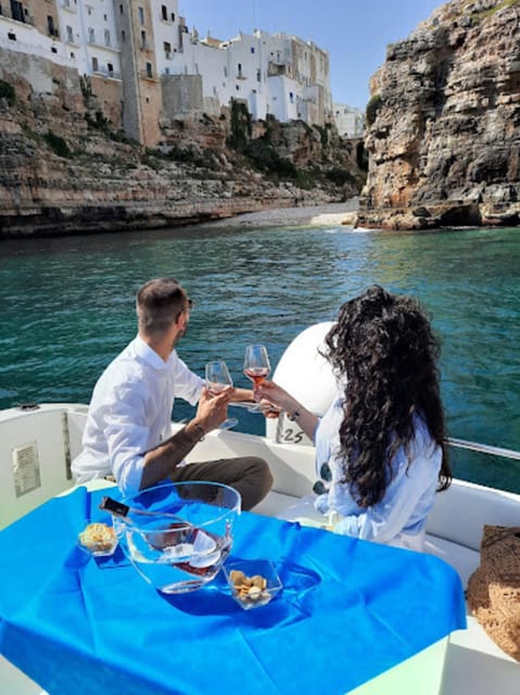 Coast and caves of Polignano:boat tours,drinks,swimming,music and fun - Grotta Palazzese: Swim Time in a Cave Setting