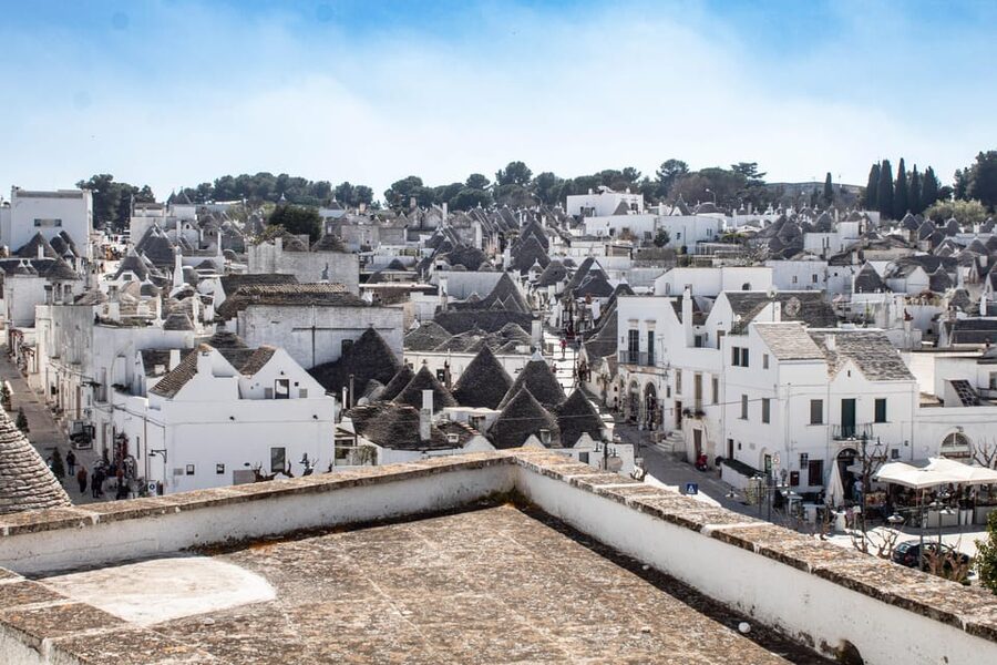 From Matera: tour of Alberobello with private transfer - Casa d’Amore: the architectural evolution stop
