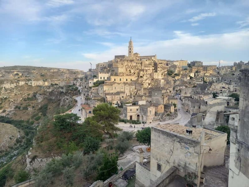 Matera: Classic Guided Walking Tour - Entering the Rock Church: Frescoes and the Idea of Negative Architecture