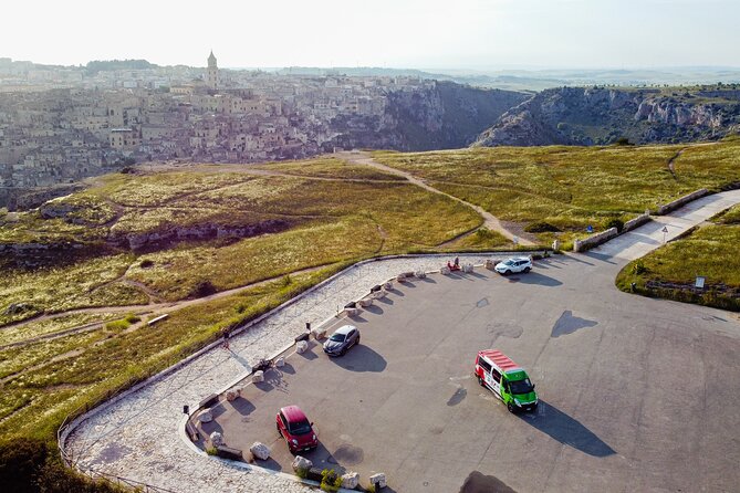 Matera Official Open Bus Tour with entrance to Casa Grotta - Stop 1: Castello Tramontano Views for Fast Orientation