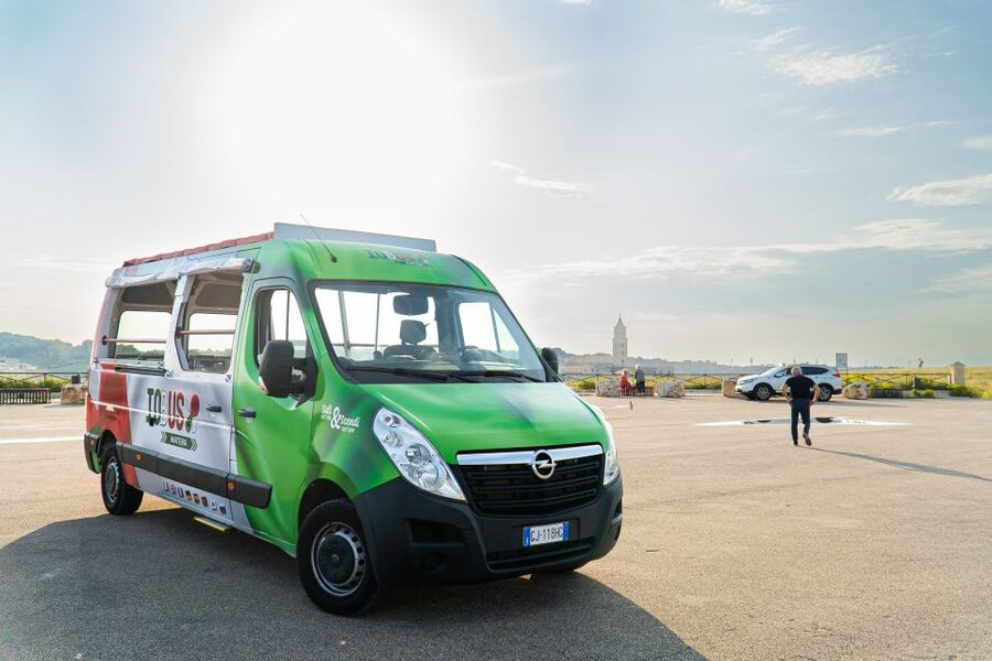 Matera: Open Top Bus Tour with Entrance to Casa Grotta - Piazza Vittorio Veneto: modern Matera with Sassi views