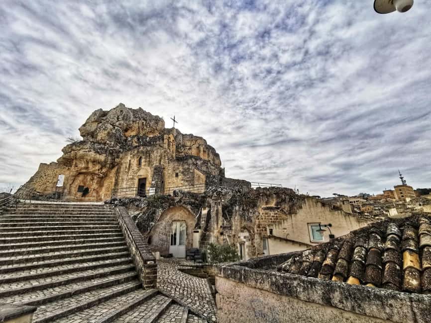 Matera: Walking tour with entries in Cave House and Church - Walking into Matera’s Sassi: what you’re really seeing
