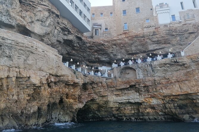 Monopoli Shared tour by Gozzo boat to the Polignano caves - The Swim Stop: Blue Water Time, Then Prosecco and Focaccia