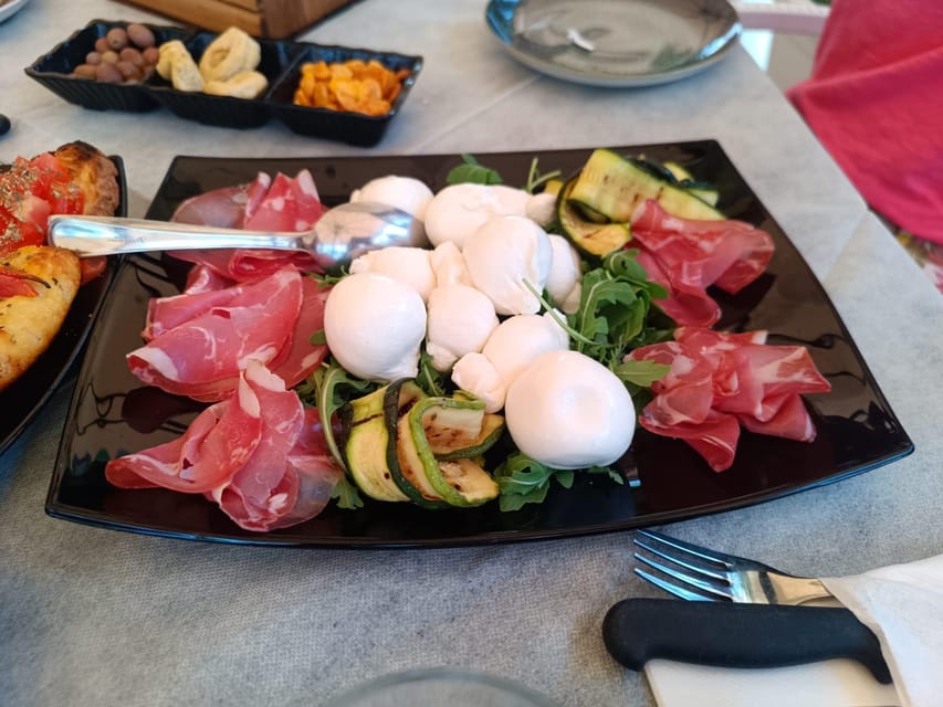 Ostuni: Alberobello, Locorotondo, Ostuni & Apulian brunch - Locorotondo: a guided hilltown stop with a circular old-town feel