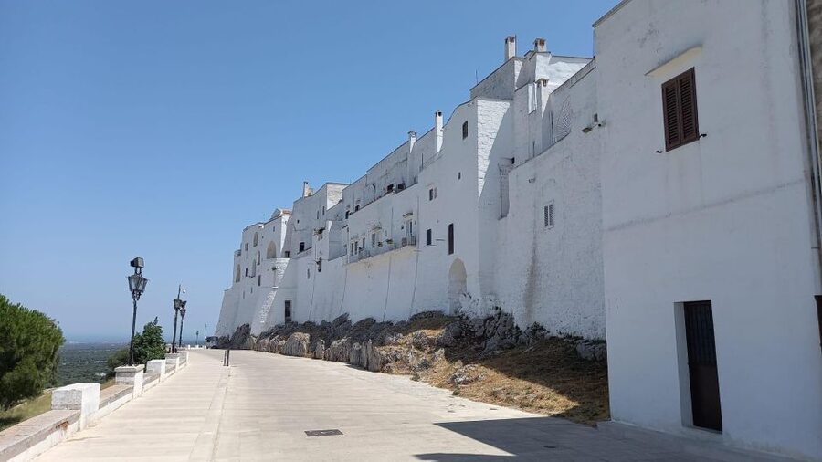 Ostuni: Guided e-bike tour to rock village & olive trees - The ancient rock village stop and the 1 km walk