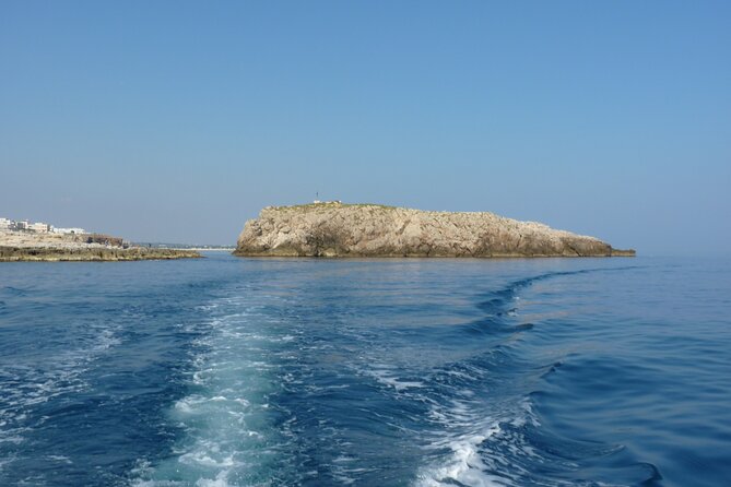 Polignano a Mare boat tour emotions, caves, diving and appetizers - Grotta Azzurra: Skylights, Blue Light, and a Quick “Wow” Moment