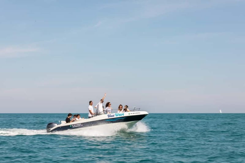 Polignano a Mare: Boat Tour with Prosecco and Snacks - Stop by stop: what happens at Lama Monachile Beach