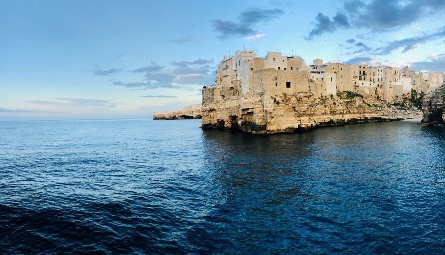 Polignano a Mare: Boat Trip, Swim & Cave with Aperitif - The Dorino experience: small group, live guide, and what happens onboard