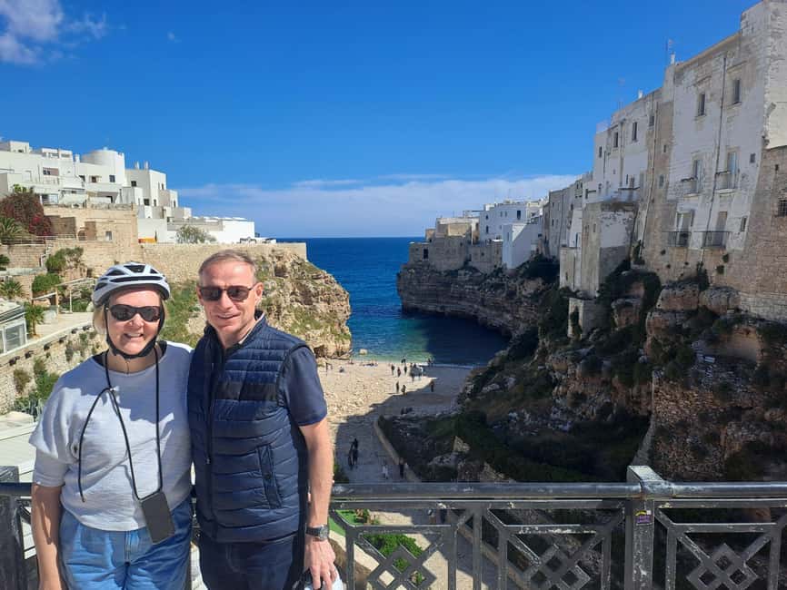 Polignano: Guided e-bike tour, sea cliffs & San Vito - A hidden marina pause: calm water after big cliffs