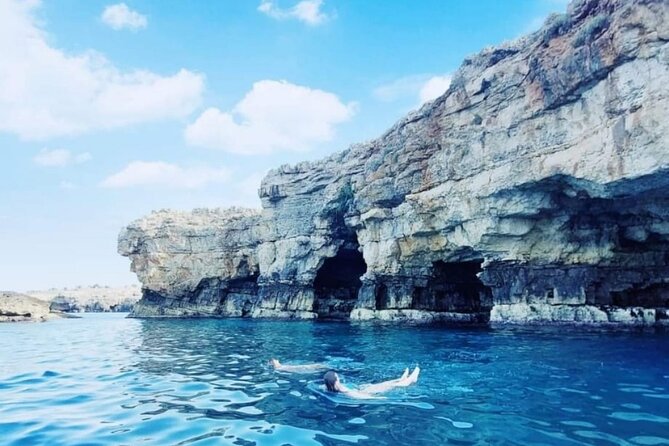 Private tour in Polignano to discover the caves with aperitif - Lama Monachile: Postcard Views and the Energy of a Cliff-Jump Event
